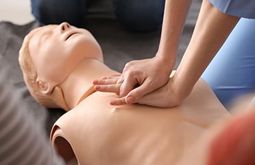 Person completing basic life support certification course