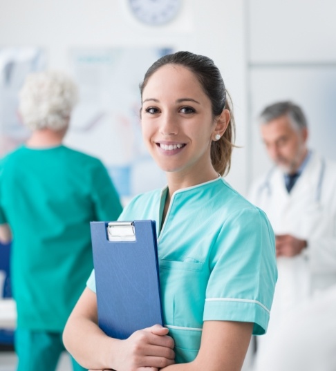 Dental assistant receiving hands-on training in a dental office