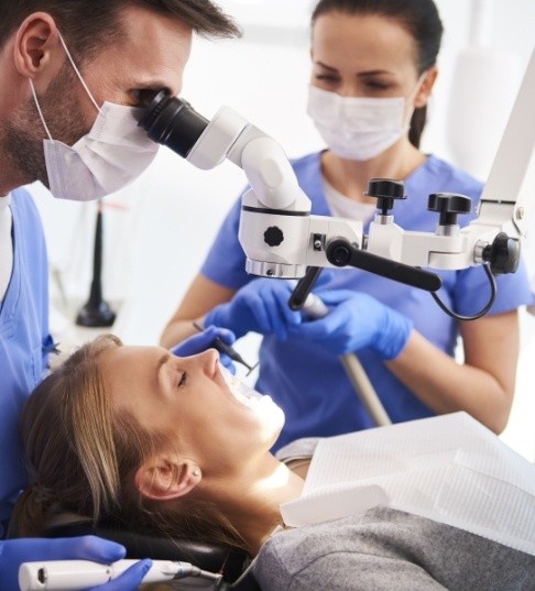 Dental assistant working alongside a dentist during treatment