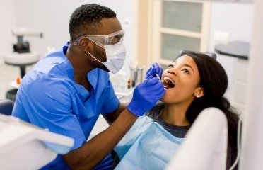 Dental assistant working in dental office