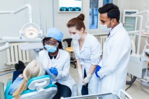 scene of employees attending continuing education for dental assistants 