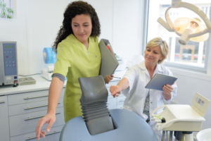 a closeup of a dental assistant working