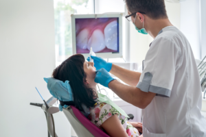 an intraoral camera being used