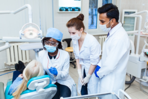 a dental assistant student receiving training