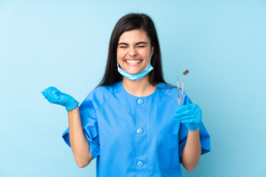 a closeup of a dental assistant smiling 