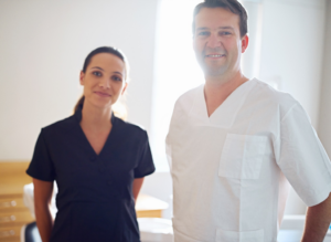 a couple of dental assistants smiling 