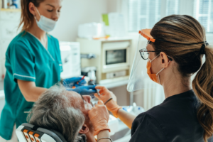 a dental assistant helping during treatment